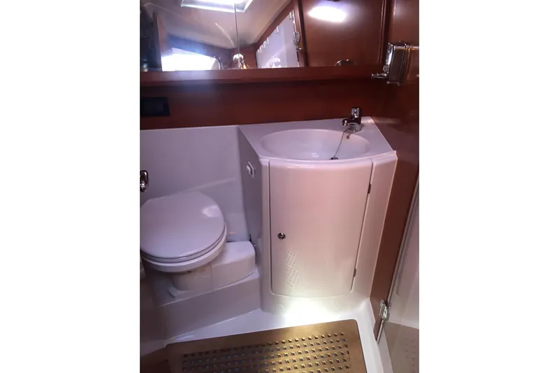 Perseverance Yacht Photos Pics Bathroom interior of 2012 Grand Soleil 43 yacht with sink and toilet.