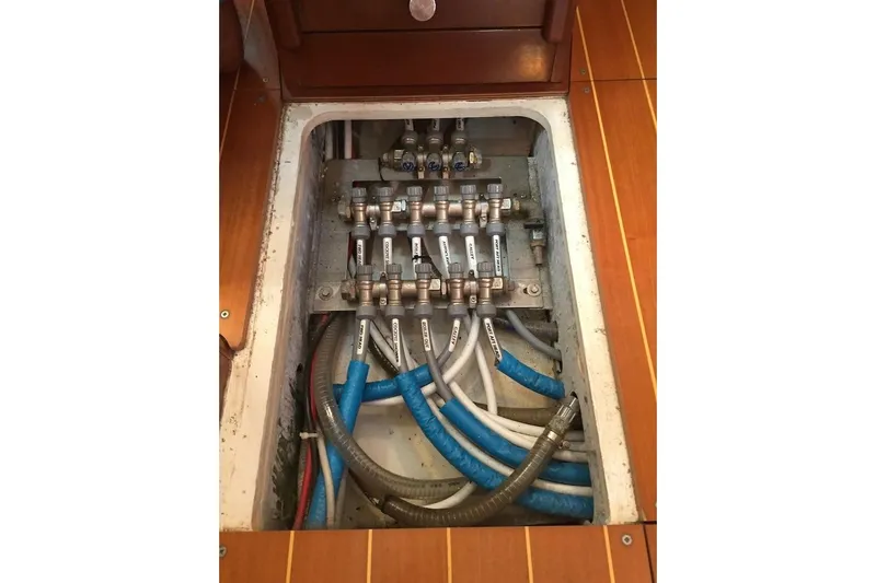 Perseverance Yacht Photos Pics Plumbing system of 2012 Grand Soleil 43 yacht, featuring labeled pipes and valves.
