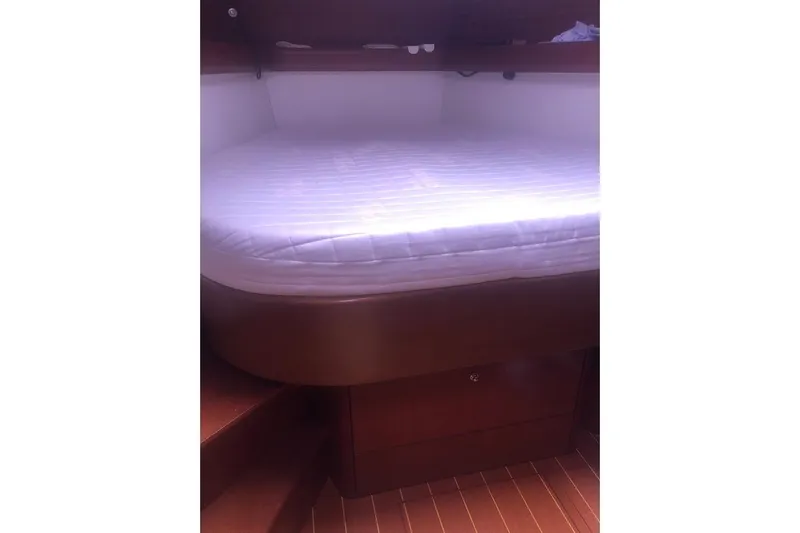 Perseverance Yacht Photos Pics Interior cabin of 2012 Grand Soleil 43 yacht with a cozy bed.