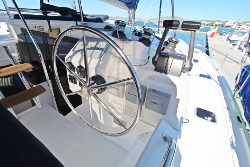  Yacht Photos Pics Helm of 2013 Fountaine Pajot Helia 44 catamaran with Garmin navigation equipment.