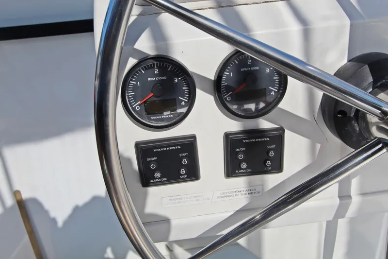  Yacht Photos Pics Steering wheel and control panel of 2013 Fountaine Pajot Helia 44 catamaran.
