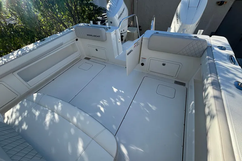 Wcn 57599 325cc Yacht Photos Pics 2025 World Cat 325 CC boat interior with white seating and storage compartments.