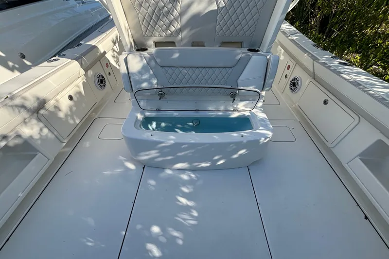 Wcn 57599 325cc Yacht Photos Pics 2025 World Cat 325 CC boat interior with open storage compartment and seating.