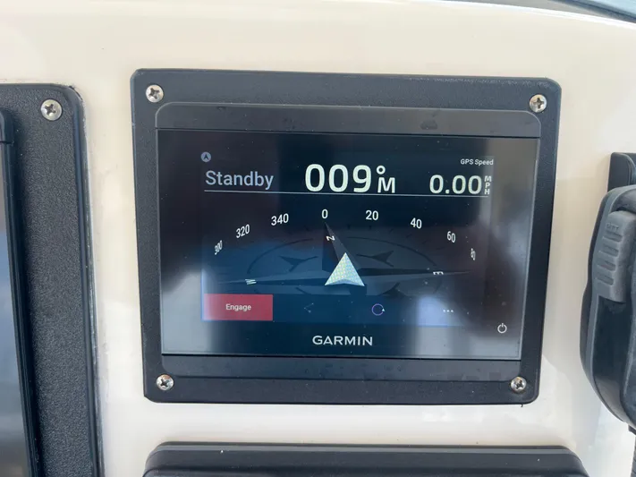  Yacht Photos Pics Garmin navigation display on 2011 Pursuit S 280 Sport boat dashboard.