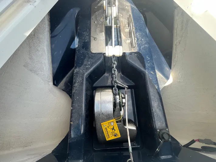  Yacht Photos Pics Anchor compartment of 2011 Pursuit S 280 Sport boat with chain and winch.