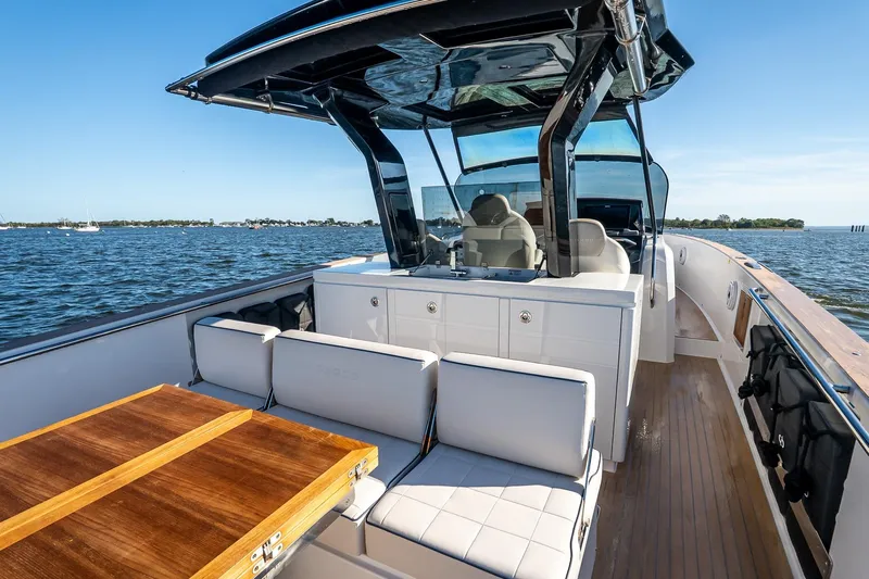 Available Now Yacht Photos Pics 2025 Pardo Yachts 38 interior with seating and table on open water.