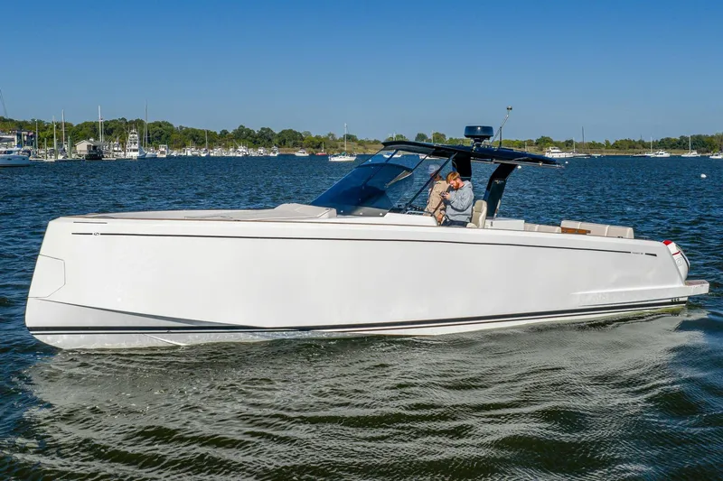 Available Now Yacht Photos Pics 2025 Pardo Yachts 38 cruising on a calm lake under clear blue skies.