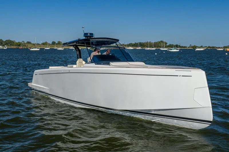 Available Now Yacht Photos Pics 2025 Pardo Yachts 38 cruising on a sunny day with scenic background.