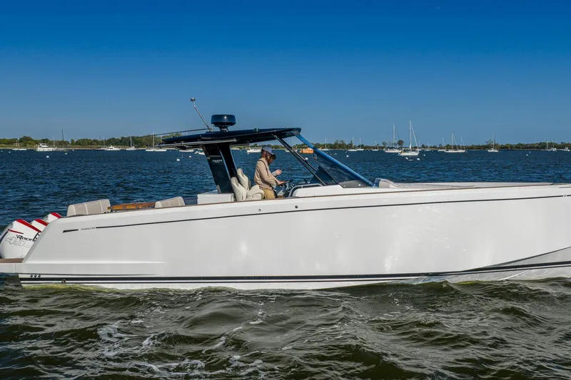 Available Now Yacht Photos Pics 2025 Pardo Yachts 38 cruising on a sunny day, sleek design, calm waters.