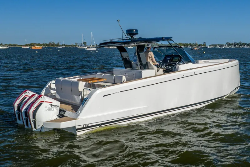 Available Now Yacht Photos Pics 2025 Pardo Yachts 38 cruising on water with triple outboard engines.