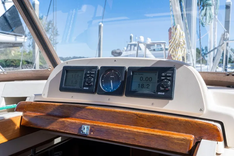 Easy Going Yacht Photos Pics Cockpit dashboard of 2008 Island Packet 465 sailboat with navigation instruments.