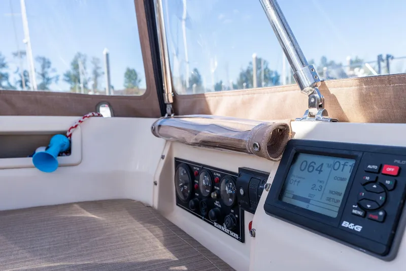 Easy Going Yacht Photos Pics Interior view of 2008 Island Packet 465 sailboat cockpit with navigation instruments.