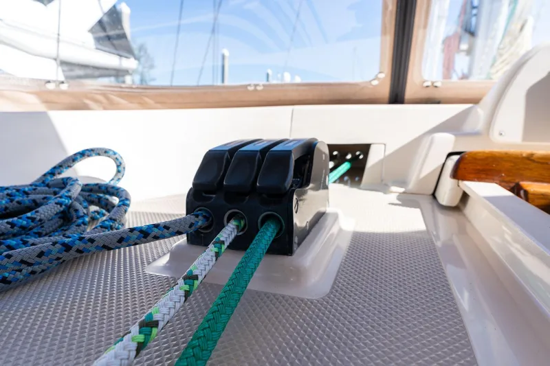 Easy Going Yacht Photos Pics Close-up of sailing ropes and cleats on a 2008 Island Packet 465 yacht deck.