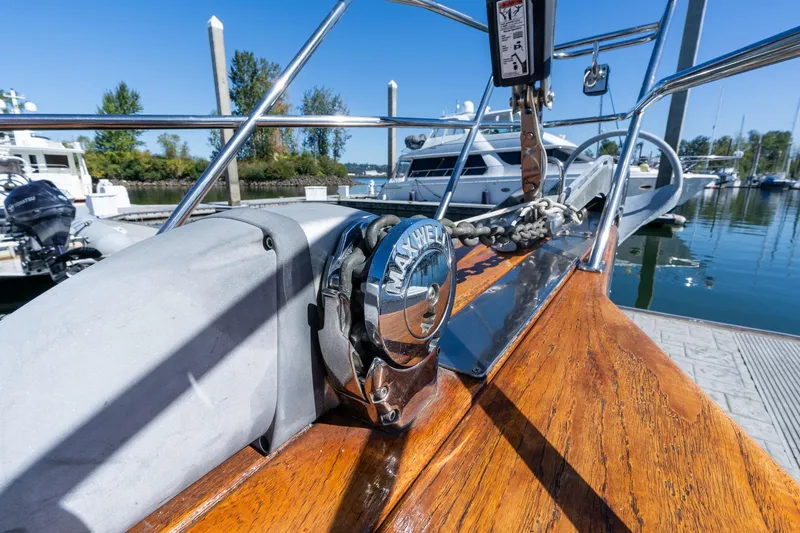 Easy Going Yacht Photos Pics 2008 Island Packet 465 yacht deck with Maxwell winch, docked in a marina.