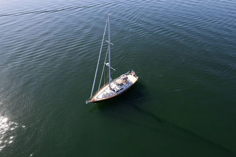 Easy Going Yacht Photos Pics Aerial view of 2008 Island Packet 465 sailboat on calm water.