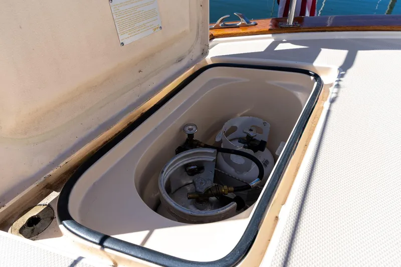 Easy Going Yacht Photos Pics Storage compartment on 2008 Island Packet 465 yacht, containing propane tanks.