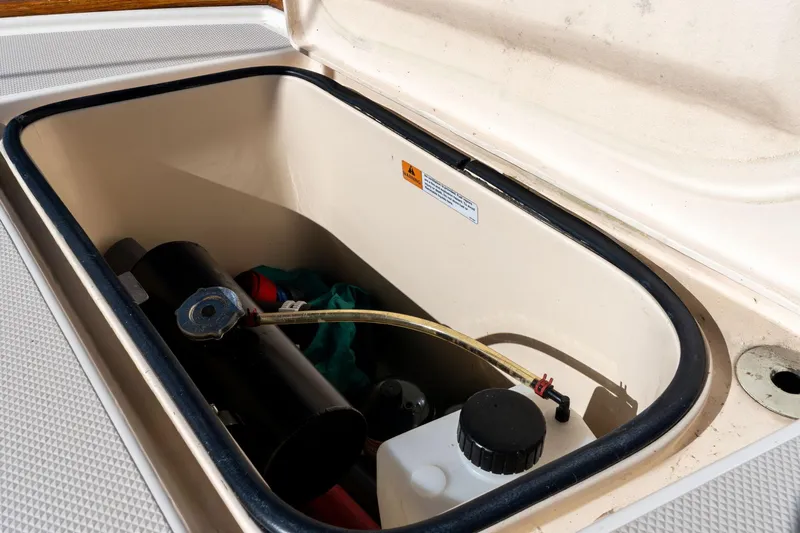 Easy Going Yacht Photos Pics Storage compartment on a 2008 Island Packet 465 sailboat, containing various equipment.