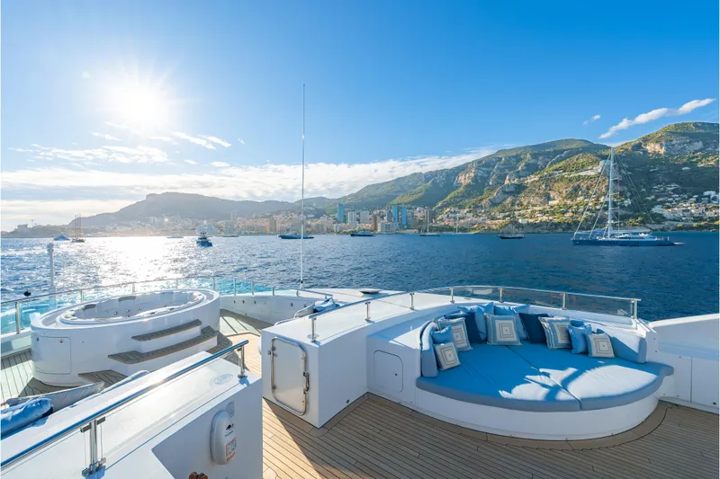 Latitude Yacht Photos Pics Luxurious Timmerman Expedition Tri-Deck yacht with scenic ocean and mountain views, 2009 model.