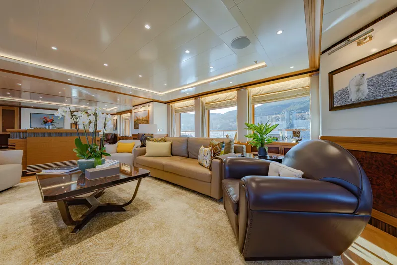 Latitude Yacht Photos Pics Luxurious interior of 2009 Timmerman Expedition Tri-Deck yacht with elegant seating and decor.