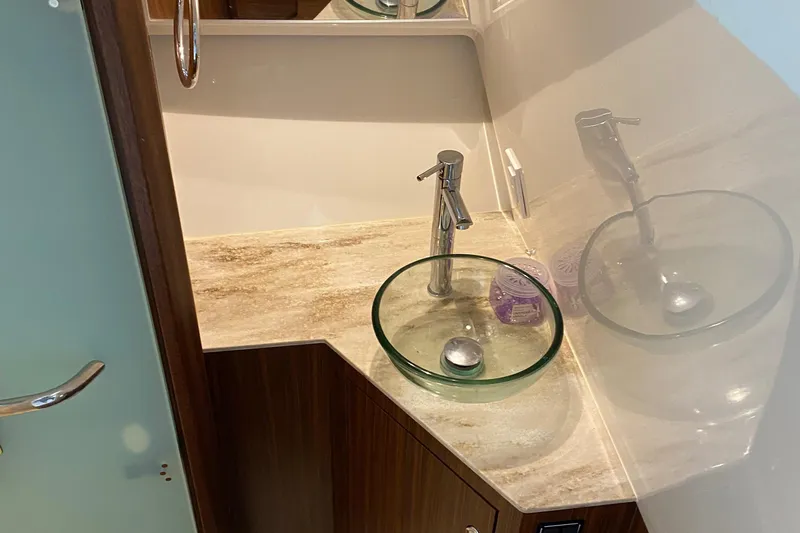  Yacht Photos Pics Modern bathroom sink in 2022 Pursuit DC 365 boat.