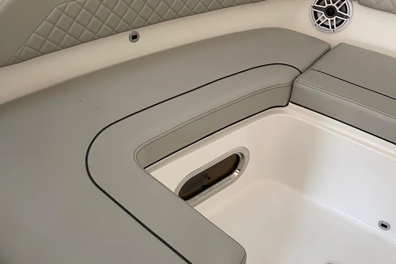  Yacht Photos Pics 2022 Pursuit DC 365 boat interior seating and storage compartment.