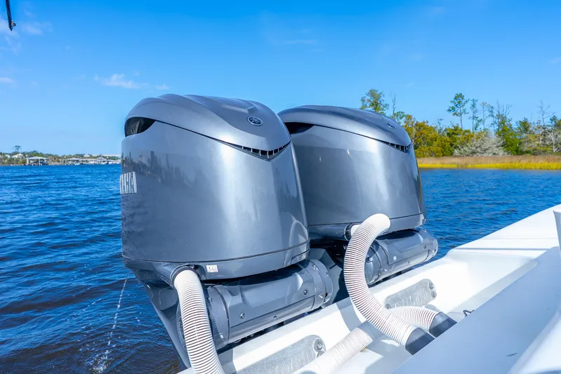  Yacht Photos Pics Twin Yamaha outboard engines on a 2014 Yellowfin 32 Offshore boat, cruising on a sunny day.