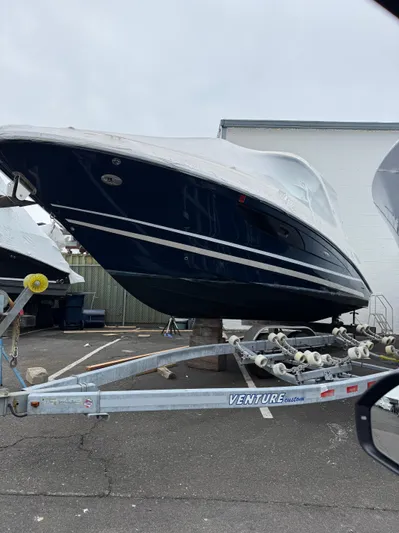 Nereids Yacht Photos Pics 2018 Sea Ray SLX 350 boat on trailer, parked outdoors.