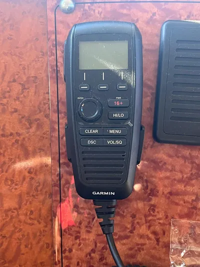  Yacht Photos Pics Garmin marine radio on Ferretti Yachts 620, 2000 model, mounted on wood panel.