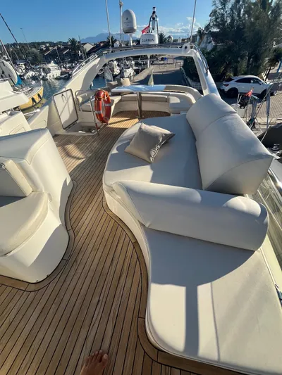  Yacht Photos Pics Luxurious 2000 Ferretti Yachts 620 deck with elegant seating and wooden flooring.