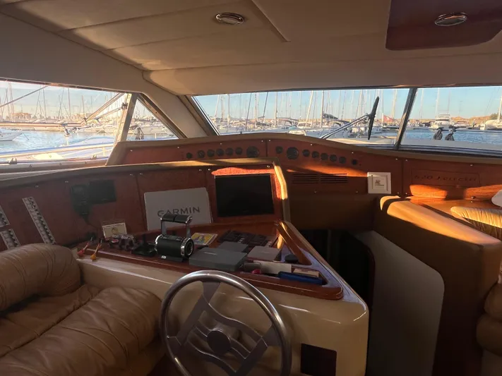  Yacht Photos Pics Interior view of 2000 Ferretti Yachts 620 cockpit with navigation equipment.