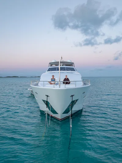 Mambo Yacht Photos Pics 2004 Ferretti Yachts 112 Custom Line on serene ocean at sunset.