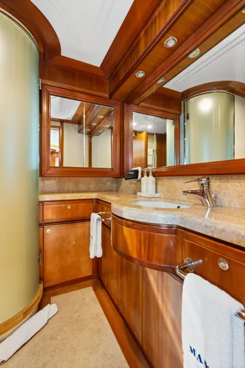 Mambo Yacht Photos Pics Luxurious bathroom in 2004 Ferretti Yachts 112 Custom Line with elegant wood finishes.