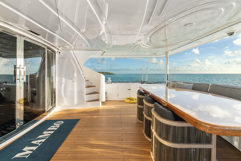 Mambo Yacht Photos Pics Luxurious deck of 2004 Ferretti Yachts 112 Custom Line with ocean view.