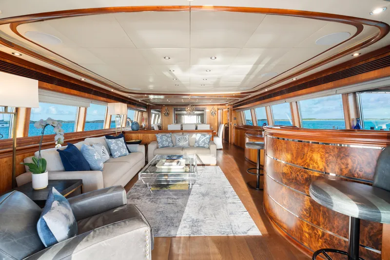 Mambo Yacht Photos Pics Luxurious interior of 2004 Ferretti Yachts 112 Custom Line, featuring elegant seating and ocean views.