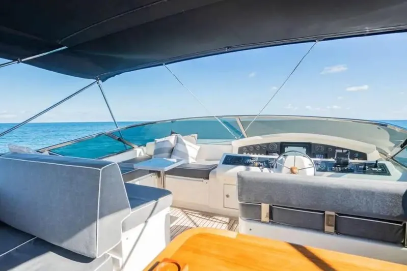 Intervention Yacht Photos Pics Luxurious 2010 Azimut 100 Leonardo yacht interior with ocean view and modern helm.