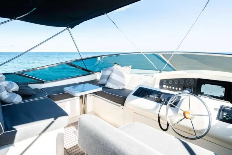 Intervention Yacht Photos Pics Luxurious 2010 Azimut 100 Leonardo yacht interior with ocean view and modern helm.