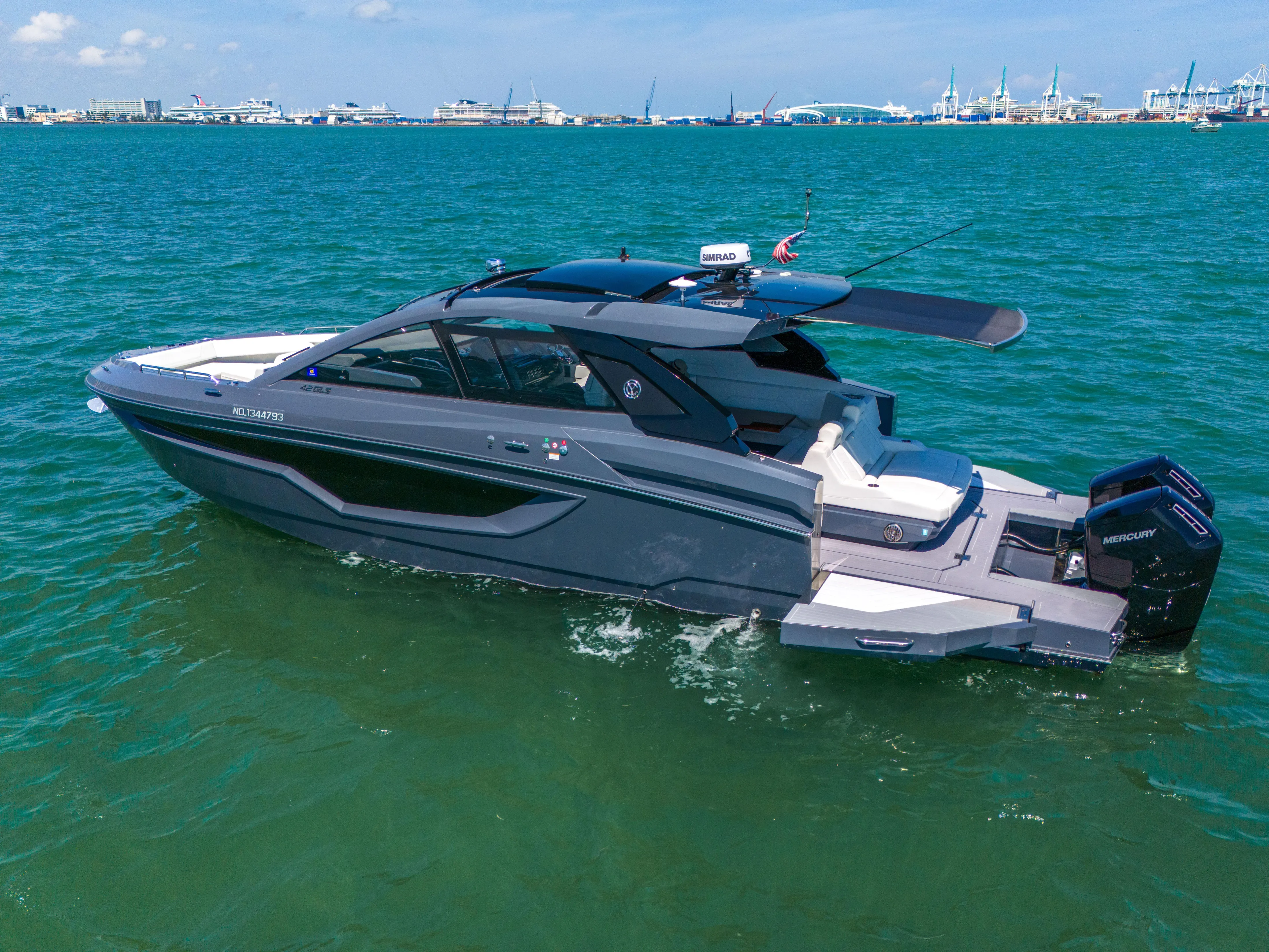  Yacht Photos Pics 2023 Cruisers Yachts 42 GLS OB on open water, showcasing sleek design and powerful outboard engines.