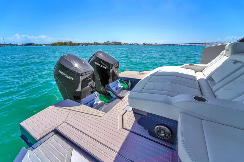  Yacht Photos Pics 2023 Cruisers Yachts 42 GLS OB with twin Mercury outboards on a sunny day.