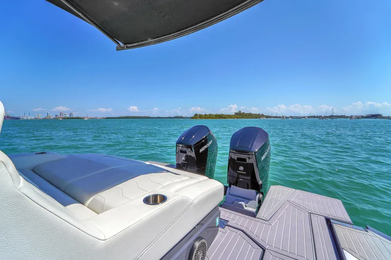  Yacht Photos Pics 2023 Cruisers Yachts 42 GLS OB on serene blue waters, showcasing luxury and performance.