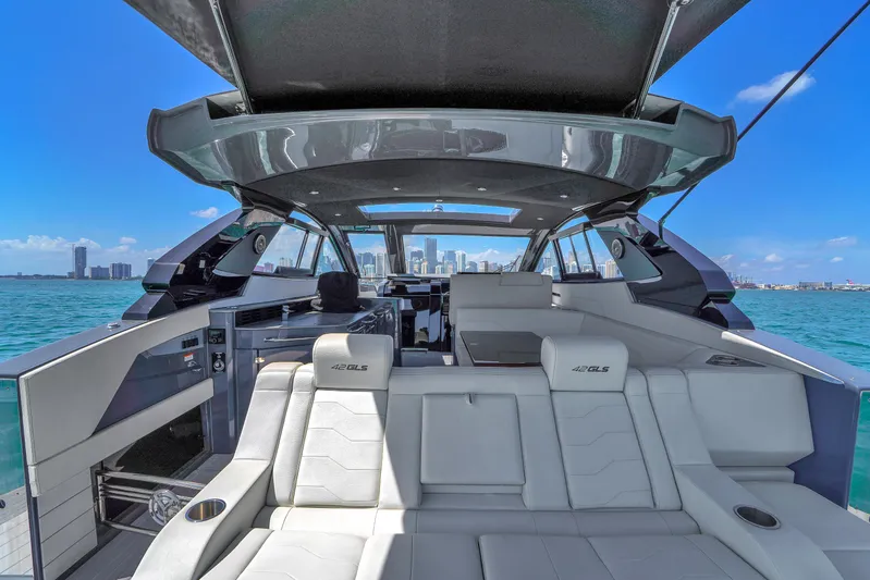  Yacht Photos Pics 2023 Cruisers Yachts 42 GLS OB interior with luxurious seating and ocean view.