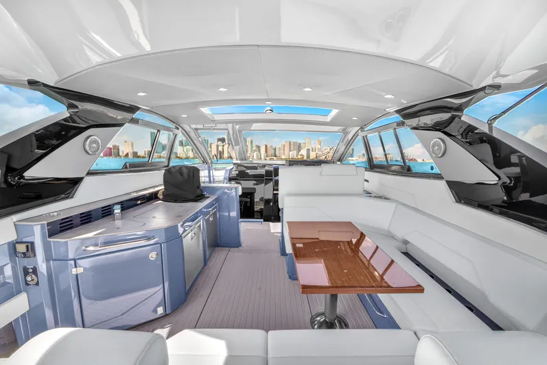  Yacht Photos Pics Luxurious interior of 2023 Cruisers Yachts 42 GLS OB with city skyline view.