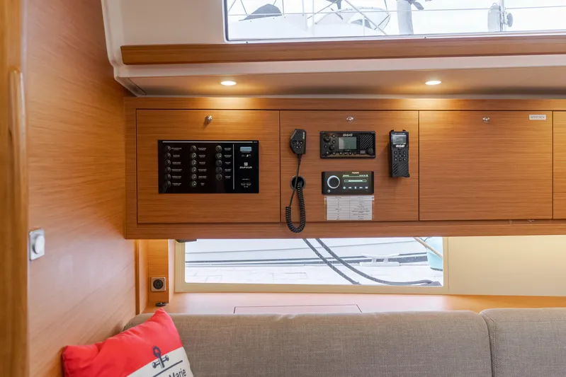 Sacha Marie Yacht Photos Pics Interior of 2024 Dufour 470 yacht with control panel and communication devices.