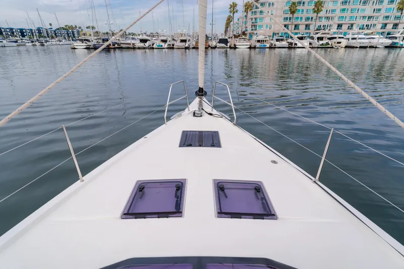 Sacha Marie Yacht Photos Pics Bow view of 2024 Dufour 470 yacht docked in a marina.