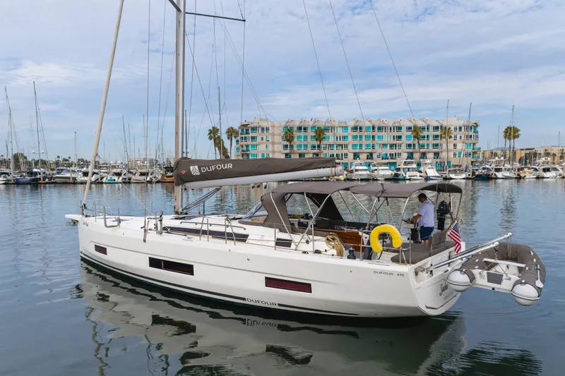 Sacha Marie Yacht Photos Pics 2024 Dufour 470 yacht docked in marina, featuring sleek design and modern amenities.