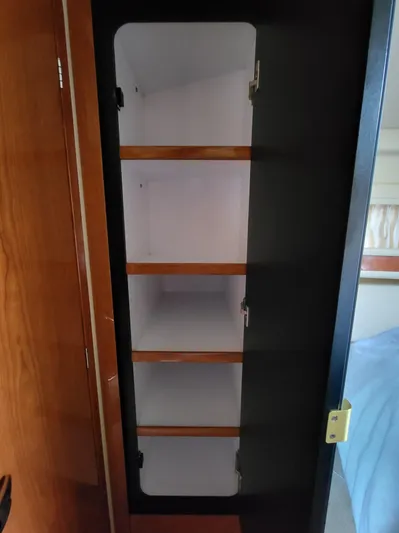  Yacht Photos Pics Empty wooden cabinet inside 2000 Sea Ray 460 Sundancer yacht.