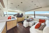Luxurious interior of 2009 Pershing 72' yacht with modern seating and decor.
