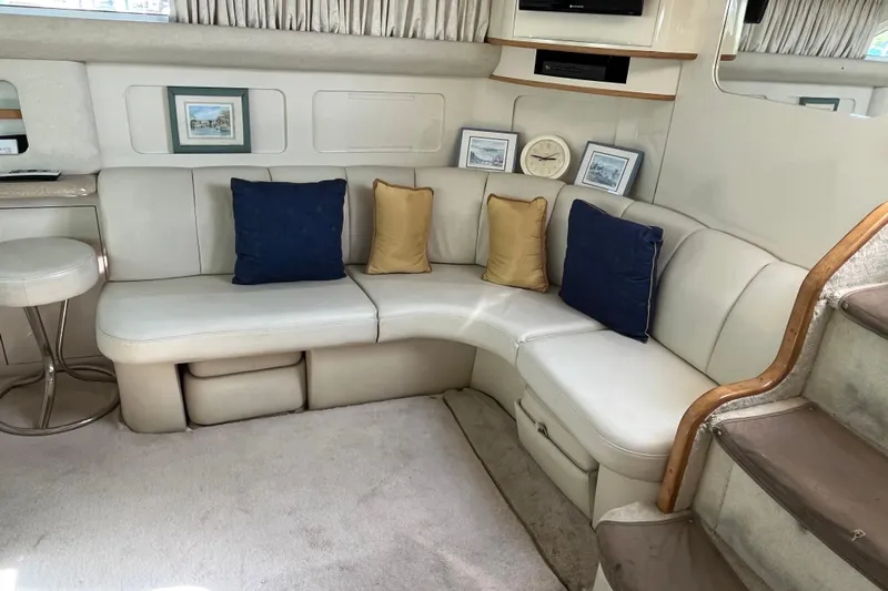  Yacht Photos Pics Luxurious 1997 Sea Ray 420 Aft Cabin interior with plush seating and elegant decor.