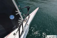 Sailboat bow on water, Custom Murray Burns Dovell 62, 1999 model.