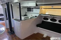 Interior of 1999 Custom Murray Burns Dovell 62 yacht with modern design and seating area.
