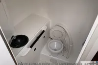 Small boat bathroom with toilet and sink, Custom Murray Burns Dovell 62, 1999 model.